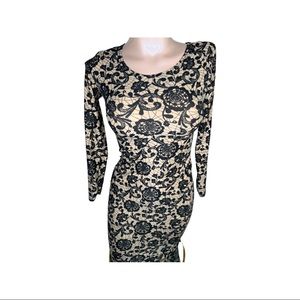 Fuzions Doll House fitted dress . Size: M . Color : nude and black